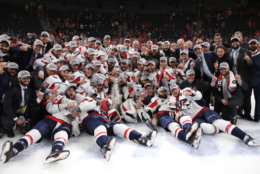 LAS VEGAS, NV - JUNE 07:  The Washington Capitals pose for a photo with the Stanley Cup after their team's 4-3 win over the Vegas Golden Knights in Game Five of the 2018 NHL Stanley Cup Final at T-Mobile Arena on June 7, 2018 in Las Vegas, Nevada.  (Photo by Bruce Bennett/Getty Images)