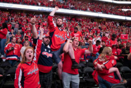 WASHINGTON, DC - JUNE 07: Washington Capitals fans celebrate after the Washington Capitals win Game 5 of the Stanley Cup Final against the Vegas Golden Nights to capture the Stanley Cup during a watch party at Capitol One Area on June 7, 2018 in Washington, DC. The Washington Capitals defeated the Vegas Golden Knights 4-3. (Photo by Alex Edelman/Getty Images)