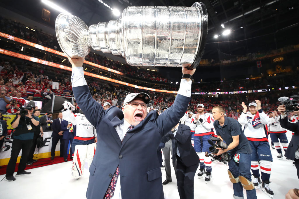 LAS VEGAS, NV - JUNE 07:  Head coach Barry Trotz of the Washington Capitals hoists the Stanley Cup after his team defeated the Vegas Golden Knights 4-3 in Game Five of the 2018 NHL Stanley Cup Final at T-Mobile Arena on June 7, 2018 in Las Vegas, Nevada.  (Photo by Bruce Bennett/Getty Images) *** Local Caption *** Barry Trotz