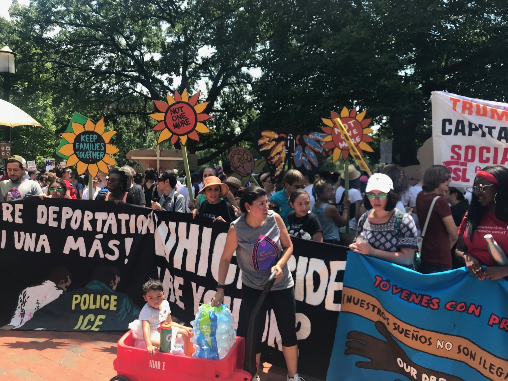 "We contemplated skipping this, because it's such a hot day … But how can you … sit home and not make your voice heard? It's too important. We would have just felt horrible not doing this," said Melissa Maher, of Baltimore, Maryland. (WTOP/Dick Uliano)
