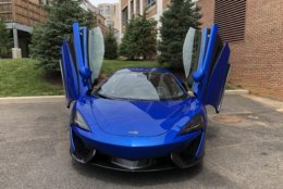 The McLaren 570S Spider is low and wide with futuristic Space Age looks. Those cool doors that flip up to open 'wow' people as much as the style of this car. (WTOP/Mike Parris)