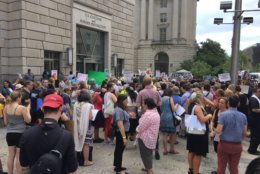 A large group of women chanted "let the children go...now" and spoke against President Trump's "zero tolerance" immigration policy outside of the United States Customs and Border Protection headquarters in D.C. on Tuesday. (Photo by Don Squires)