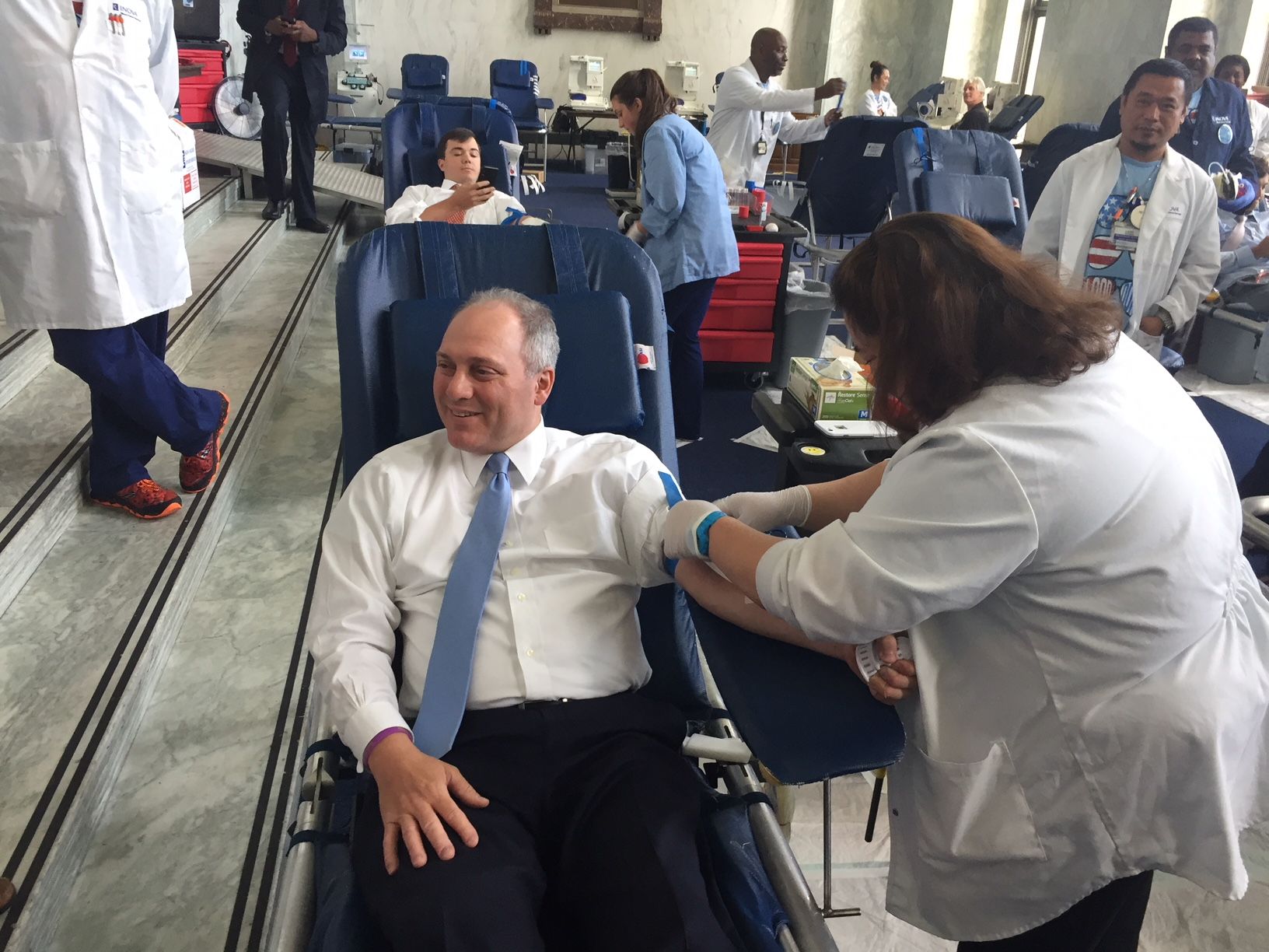 Steve Scalise giving blood at the annual Congressional Blood Drive. (WTOP/John Domen)