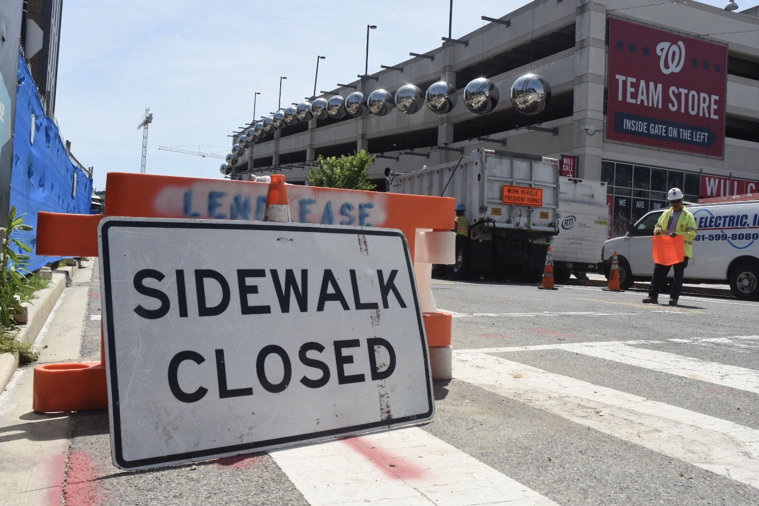 Many sidewalks around Nationals Park are closed or constricted by ongoing construction along Half Street SE and N Street SE. (WTOP/Dave Dildine)