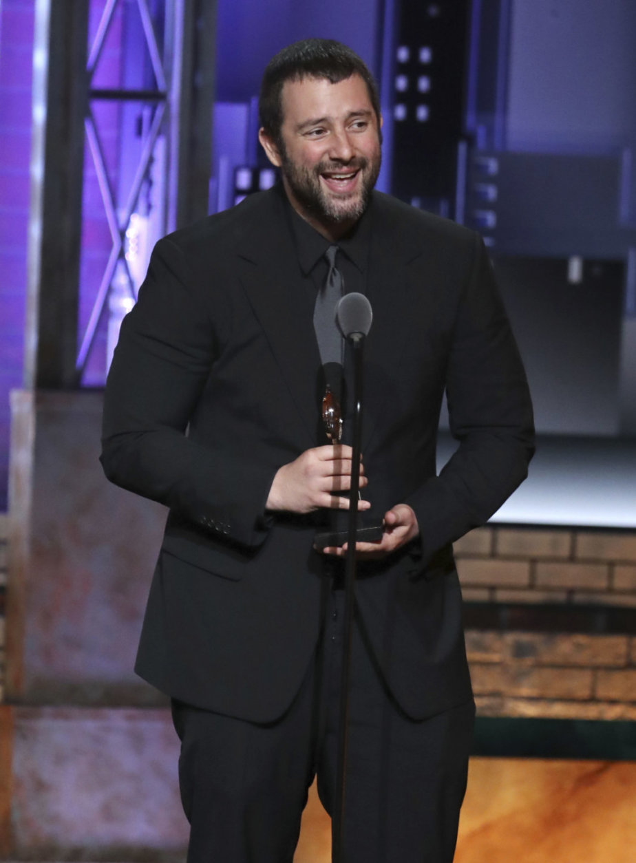 Itamar Moses accepts the award for book of a musical for "The Band's Visit" at the 72nd annual Tony Awards at Radio City Music Hall on Sunday, June 10, 2018, in New York. (Photo by Michael Zorn/Invision/AP)