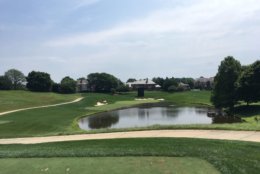 The tee shot over the water on 17 at TPC Potomac is right in the middle of the action for the Quicken Loans National. (WTOP/Noah Frank)