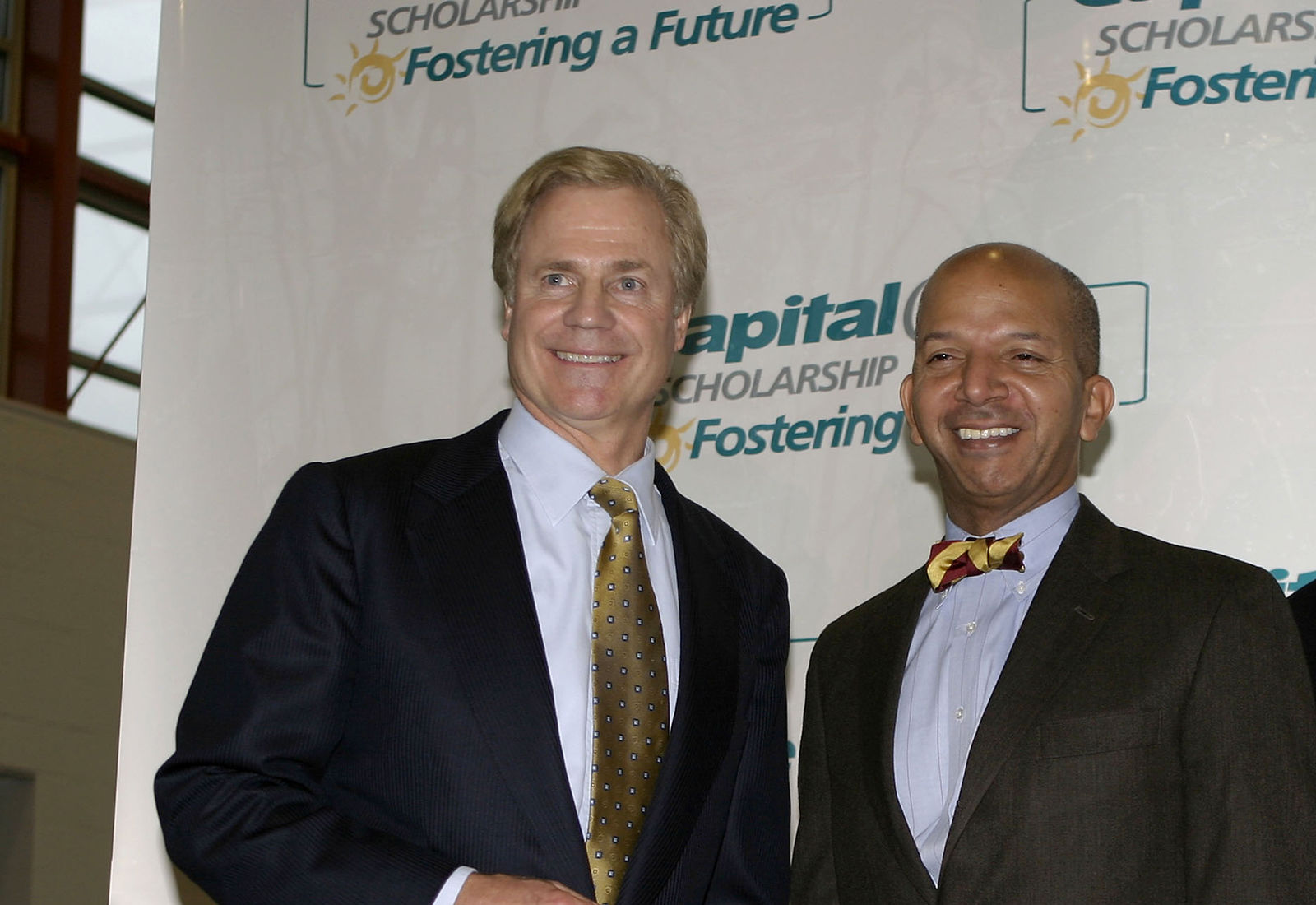 Capital One Founder and CEO, Richard Fairbank, seen here in 2004 with then D.C. Mayor Anthony Williams, was ranked No. 64 on Glassdoor's list of the top 100 CEOs in the U.S. File. (Photo by Shaun Heasley/Getty Images)