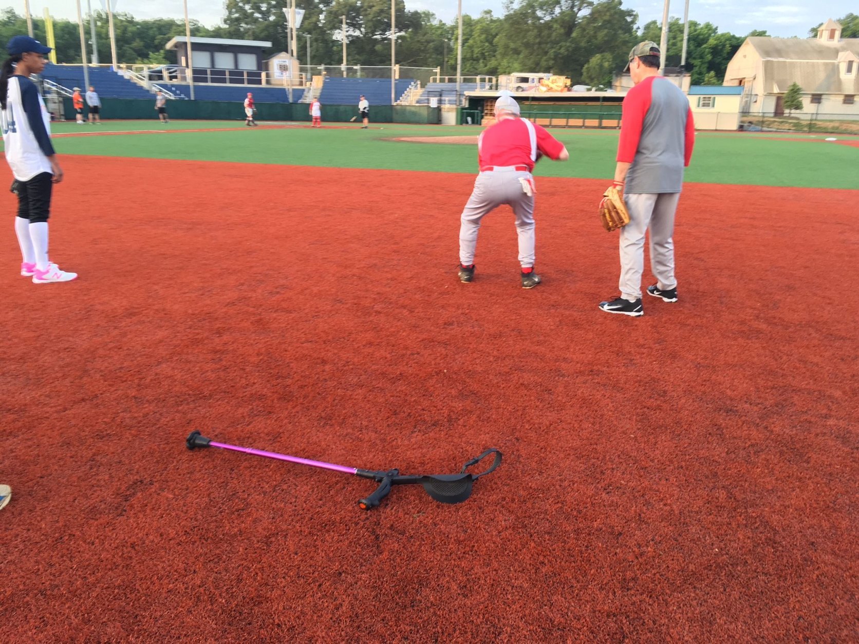 Rep. Steve Scalise, who is still using a crutch to move around, takes grounders at Republican practice the week before this year's game. (WTOP/Noah Frank)