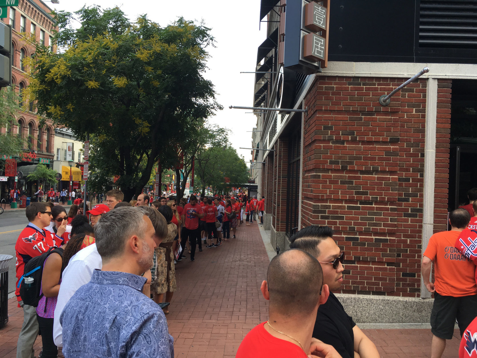 Fans line up outside a Chinatown bar Thursday afternoon. (Courtesy Cody House)