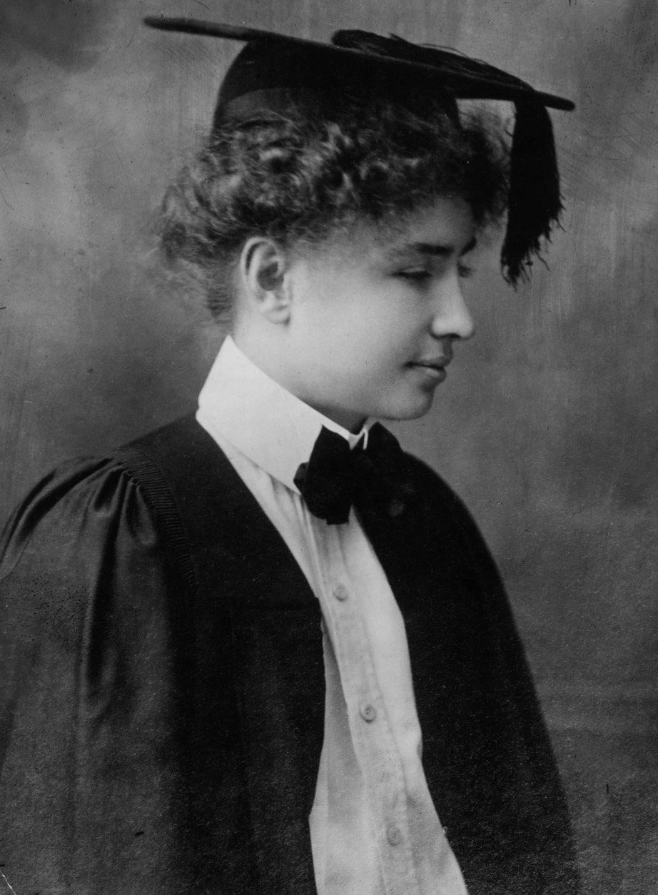 1904:  American lecturer and writer Helen Adams Keller (1880 - 1968) on the day of her graduation from Radcliffe College, Massachusetts. Blind, deaf and mute from the age of one, she was taught to read Braille, speak and lipread with her fingers by teacher Anne Sullivan.  (Photo by Topical Press Agency/Getty Images)