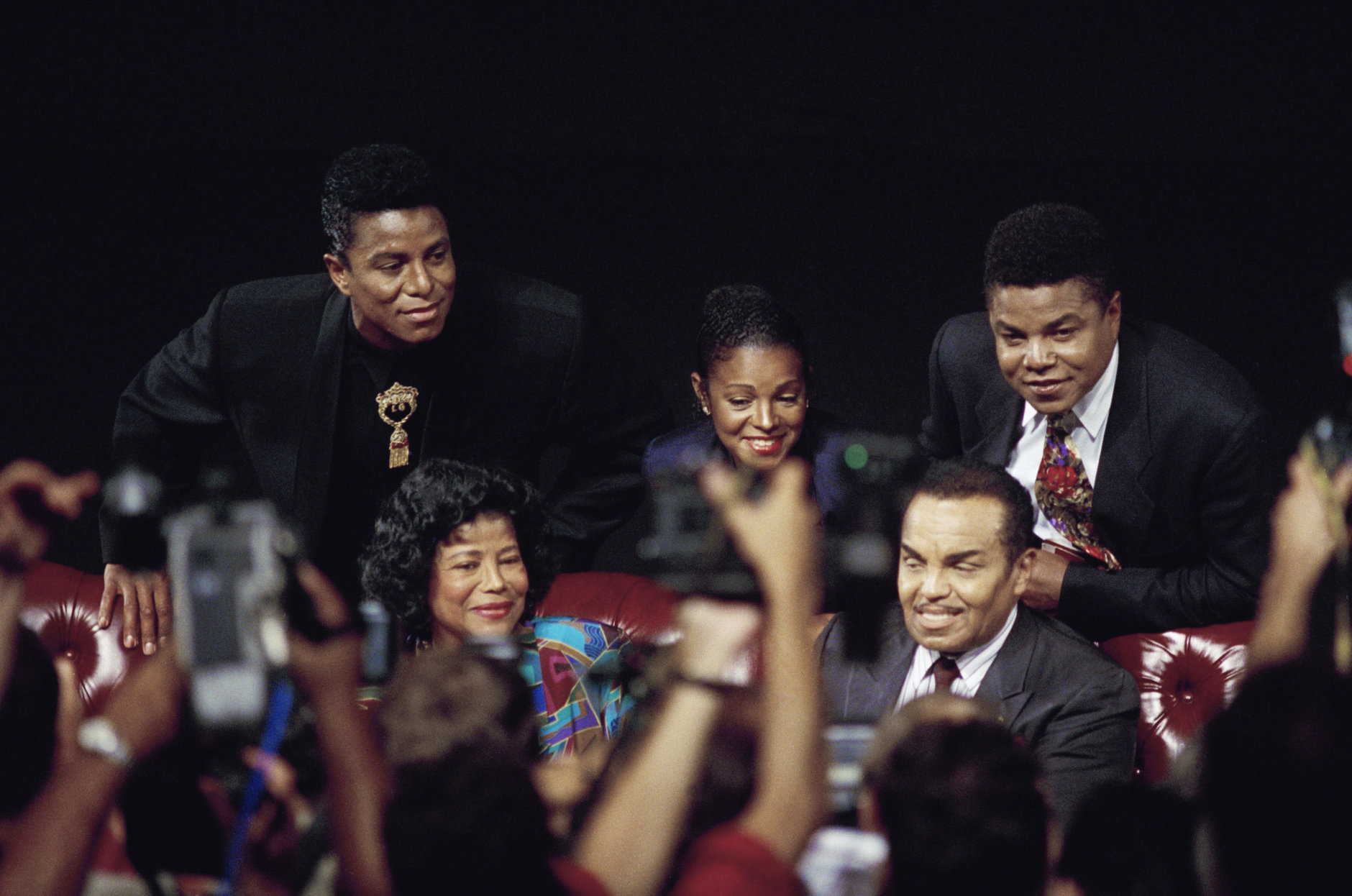 Member of the Jackson family pose for photographers after a press conference Monday, August 30, 1993 in Los Angeles to promote a benefit concert involving the family. From left are Brother Jermaine Jackson, mother Katherine, sister Rebbie, husband Joe and Brother Tito. The family defended pop star Michael Jackson who is under investigation following child molestation allegations. (AP Photo/ Eric Draper)