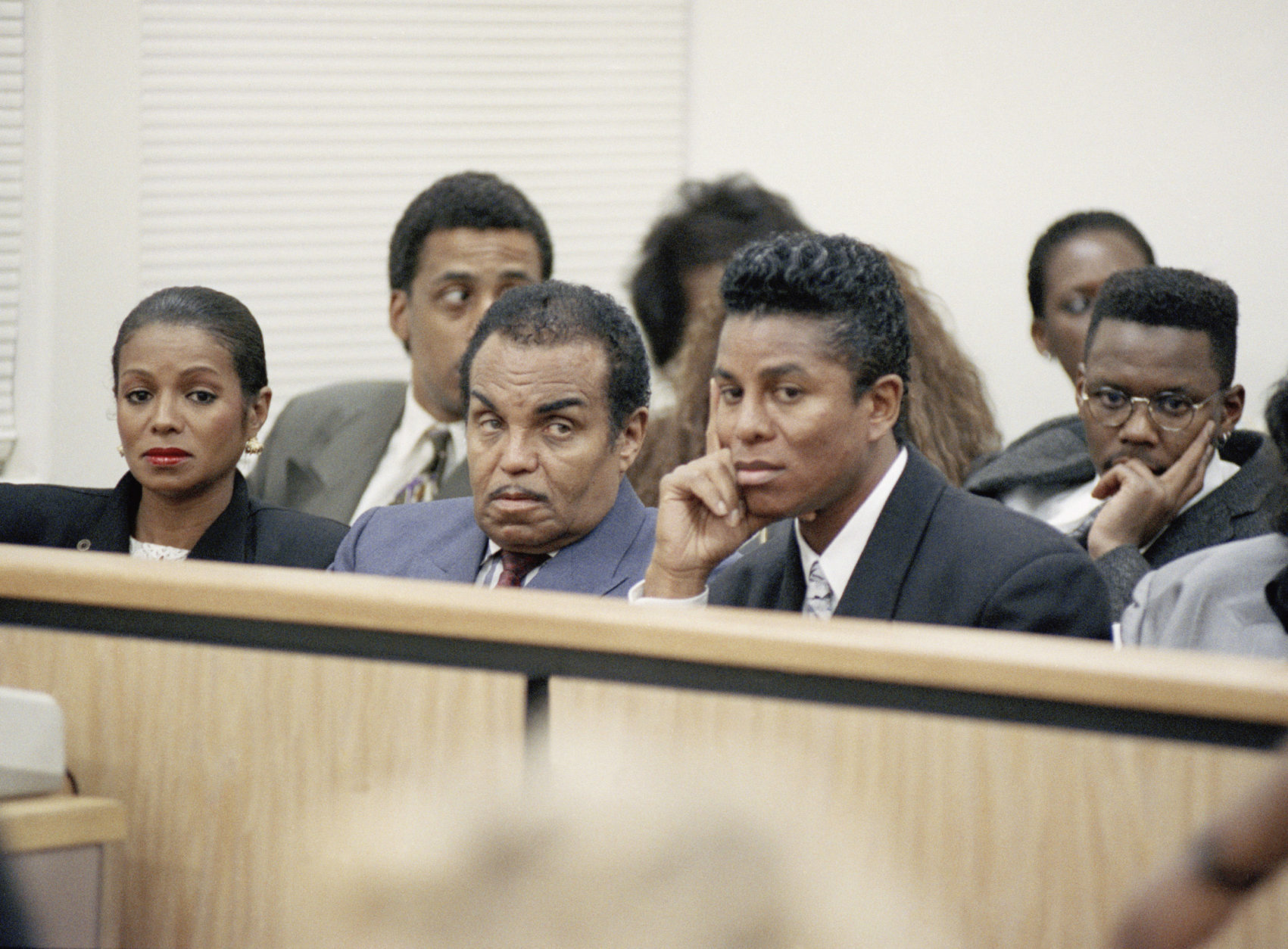 Family patriarch Joseph Jackson, center, and his son, Jermaine, sit in Los Angeles Courtroom Wednesday, Nov. 27 as another son, Randy, is ordered to a hospital lockup on charges he beat his wife over a year long period of brutality. Randy, also the brother of pop superstar Michael Jackson, will being domestic violence counseling while in the hospital. (AP Photo/ Nick Ut)