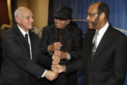 From left, Simon Sahouri, President of the Jackson Family Foundation, Joe Jackson, father of Michael Jackson, and Rudy Clay, Mayor of Gary, Ind., pose for a photograph at a press conference on Wednesday, June 2, 2010, in Gary, Ind. Work could begin next year on a $300 million museum and arts center dedicated to Michael Jackson in his hometown, his father and Gary officials announced Wednesday. (AP Photo/John Smierciak)