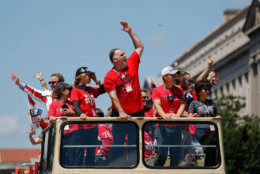 Chef Jose Andres, center, gestures while celebrating during the Washington Capitals NHL hockey Stanley Cup victory. (AP Photo/Pablo Martinez Monsivais)