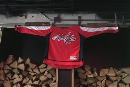  A Caps jersey greets fans with open arms at Bar Deco along 6th Street in Northwest D.C. (WTOP/Liz Anderson)