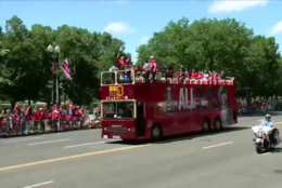 The Stanley Cup champs sat atop a bright red bus for the parade. (Screenshot of via NBC Washington livestream)
