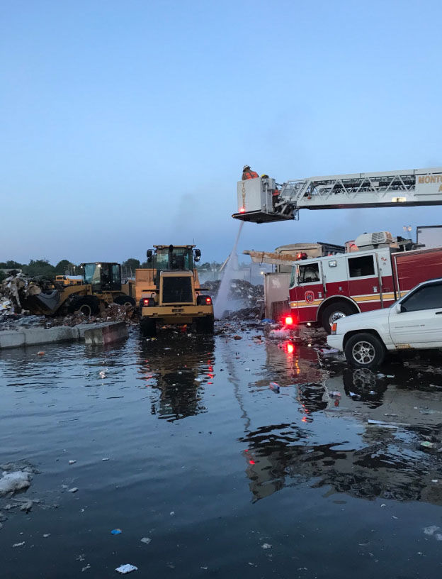 Montgomery County firefighters continue to put out a fire that broke out at a Rockville, Maryland, recycling plant on Friday, June 15, 2018. (Courtesy Montgomery County Fire and Rescue)