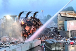 Fire crews remain on the scene into the night on Friday, June 15, 2018, to combat a blaze at a Rockville, Maryland, recycling plant. (Courtesy Montgomery County Fire and Rescue)