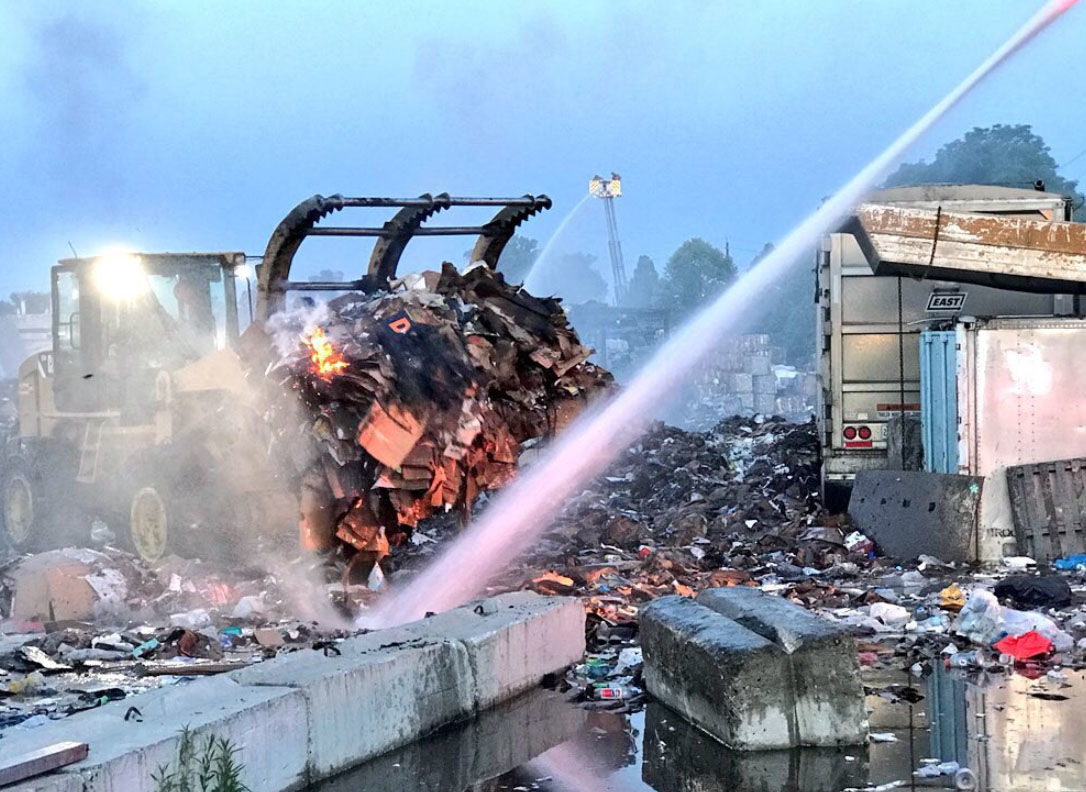 Fire crews remain on the scene into the night on Friday, June 15, 2018, to combat a blaze at a Rockville, Maryland, recycling plant. (Courtesy Montgomery County Fire and Rescue)