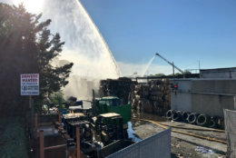 Montgomery County firefighters douse a fire that broke out at a Rockville recycling plant on Friday, June 15, 2018. (Courtesy Montgomery County Fire and Rescue)