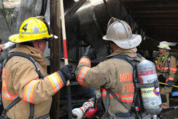 Firefighters inspect the damages after a fire broke out in a shed in Seneca Creek State Park (Courtesy Montgomery County Fire and EMS)
