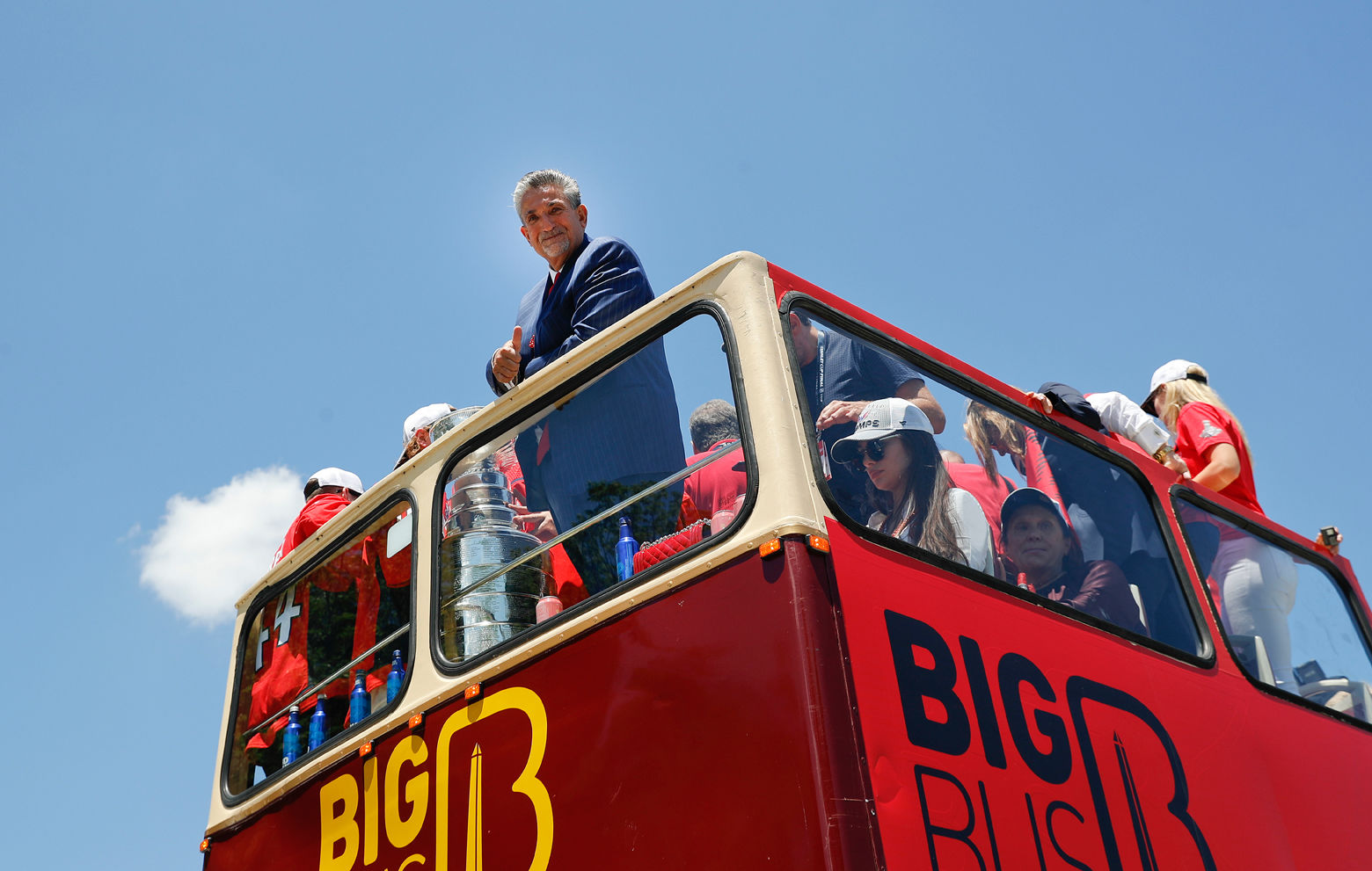 Washington Capitals owner Ted Leonsis looks down from the bus. (AP Photo/Pablo Martinez Monsivais)