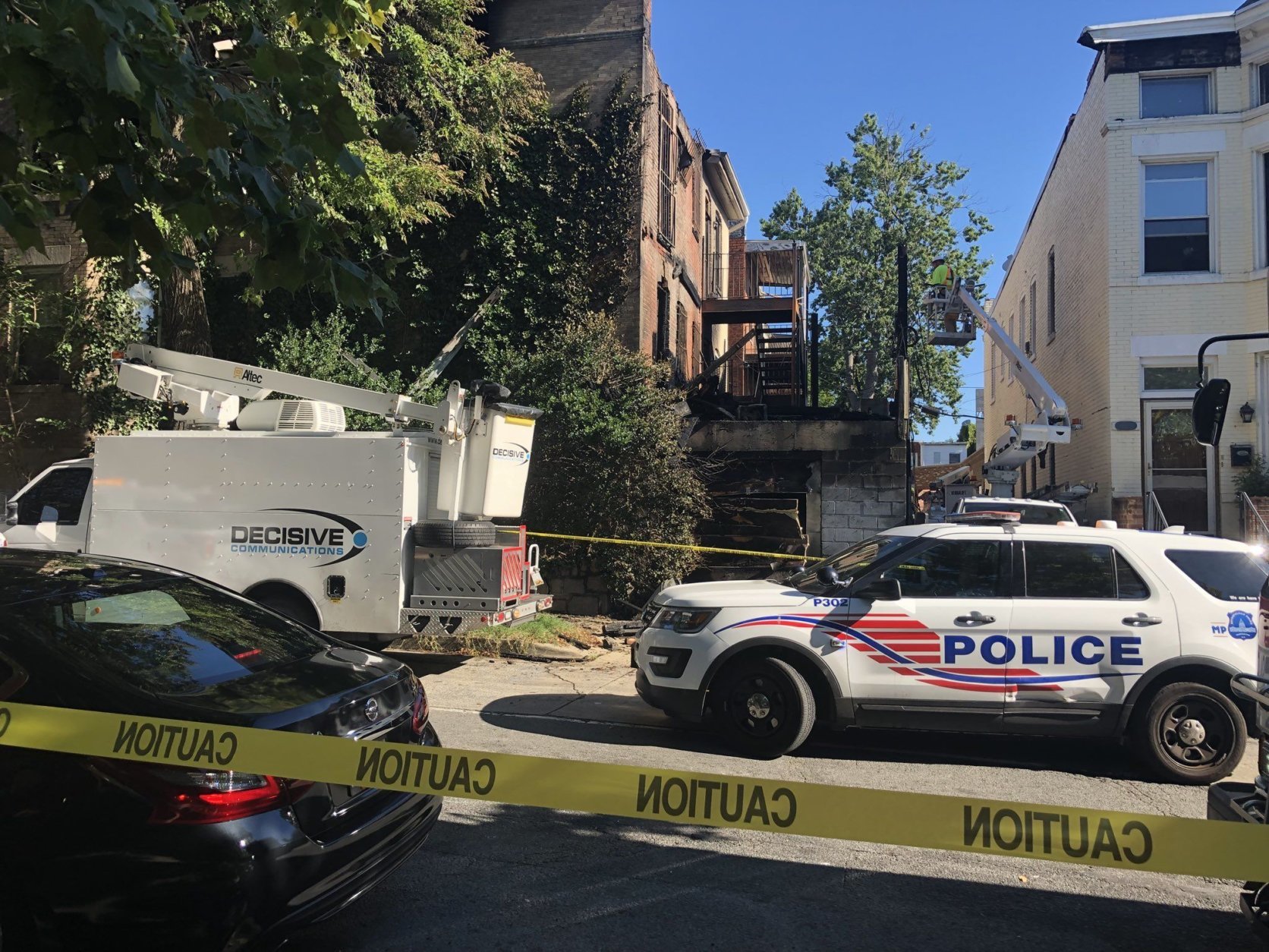 Although the fire alarms went off, officials say yelling from neighbors helped get the family, including three children, out before the structure was engulfed by flames. (WTOP/Melissa Howell)
