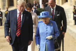 Britain's Queen Elizabeth II, right and US President of the United States, Donald Trump walk from the Quadrangle after inspecting the Guard of Honour, during the president's visit to Windsor Castle, Friday, July 13, 2018 in Windsor, England. The monarch welcomed the American president in the courtyard of the royal castle. (Chris Jackson/Pool Photo via AP)