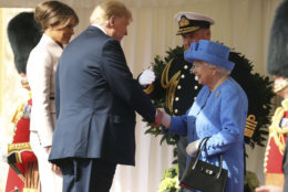 Britain's Queen Elizabeth II, right, shakes hands with US President of the United States, Donald Trump and First Lady, Melania Trump, during his visit to Windsor Castle, Friday, July 13, 2018 in Windsor, England. (Chris Jackson/Pool Photo via AP)