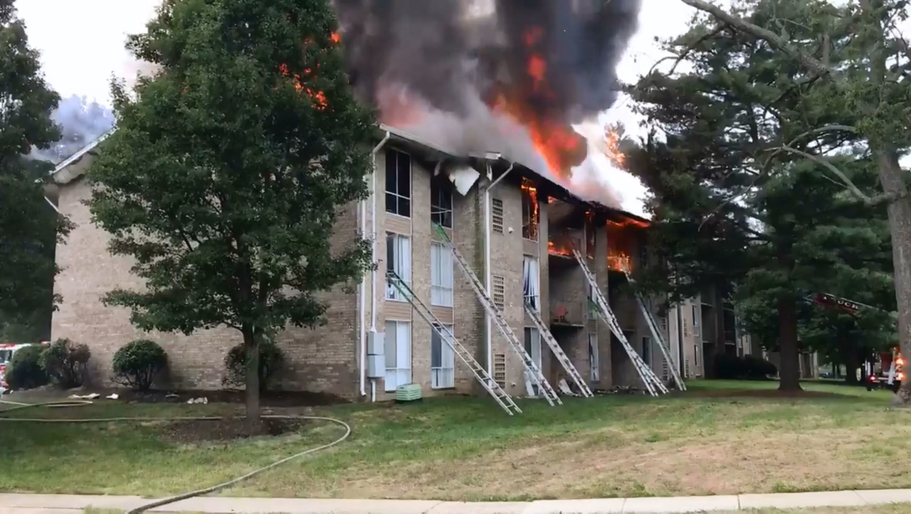 A two-alarm fire engulfs an apartment building on Edmonston Road in Greenbelt, Maryland. (Courtesy Mark Brady/Prince George's County Fire)