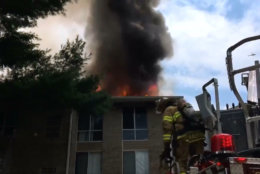 A two-alarm fire engulfs an apartment building on Edmonston Road in Greenbelt, Maryland. (Courtesy Mark Brady/Prince George's County Fire)