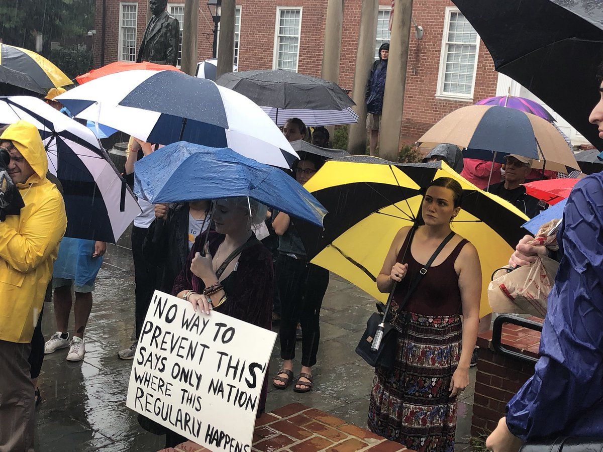 Standing in front of the state house in Annapolis, Maryland, on Saturday, dozens of Great Mills high school students and a survivor of the Capital Gazette shooting spoke out against gun violence. (WTOP/Melissa Howell)