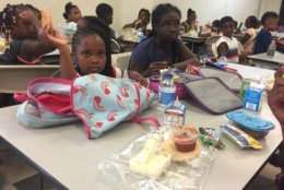Some children participating in WTEF summer camp bring their own lunches, others eat meals provided by the organization. (WTOP/Kristi King)