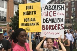 Hundreds of people took part in a protest against U.S. Immigration and Customs Enforcement (ICE) in the Columbia Heights neighborhood of Northwest D.C. Monday night. (WTOP/Michelle Basch)