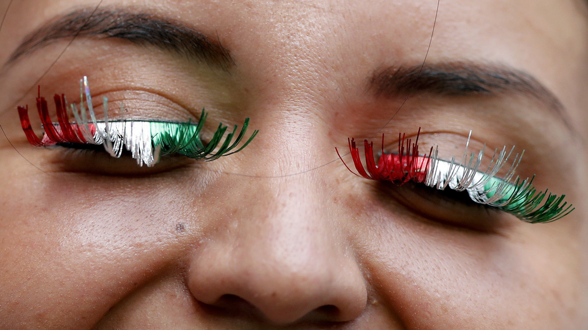 A supporter of Mexico arrives for the round of 16 match between Brazil and Mexico at the 2018 soccer World Cup in the Samara Arena, in Samara, Russia, Monday, July 2, 2018. (AP Photo/Frank Augstein)