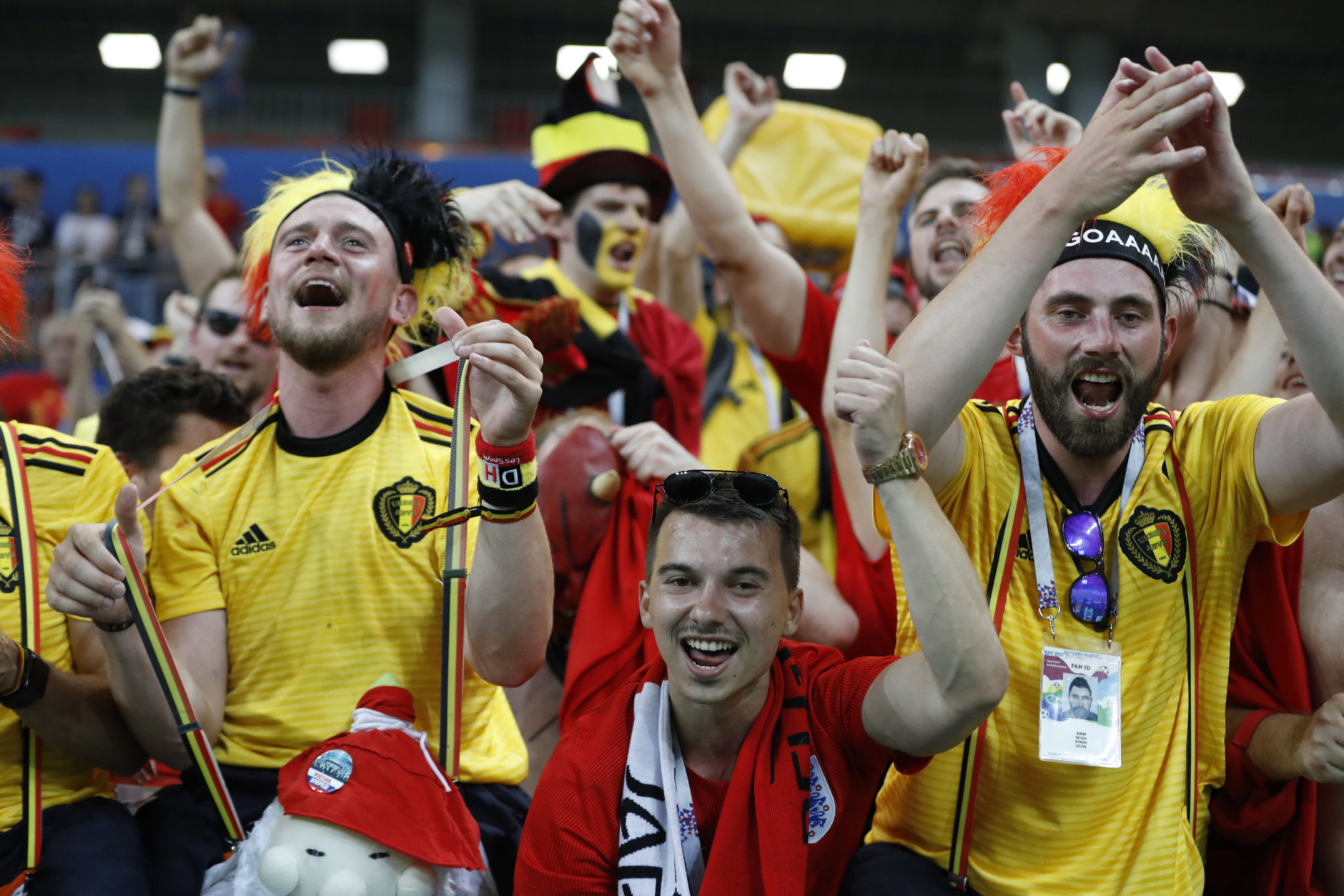 Belgium's fans celebrate their team victory over Japan during the round of 16 match between Belgium and Japan at the 2018 soccer World Cup in the Rostov Arena, in Rostov-on-Don, Russia, Monday, July 2, 2018. (AP Photo/Rebecca Blackwell)