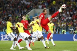 England's Harry Kane tries to control the ball during the round of 16 match between Colombia and England at the 2018 soccer World Cup in the Spartak Stadium, in Moscow, Russia, Tuesday, July 3, 2018. (AP Photo/Matthias Schrader)