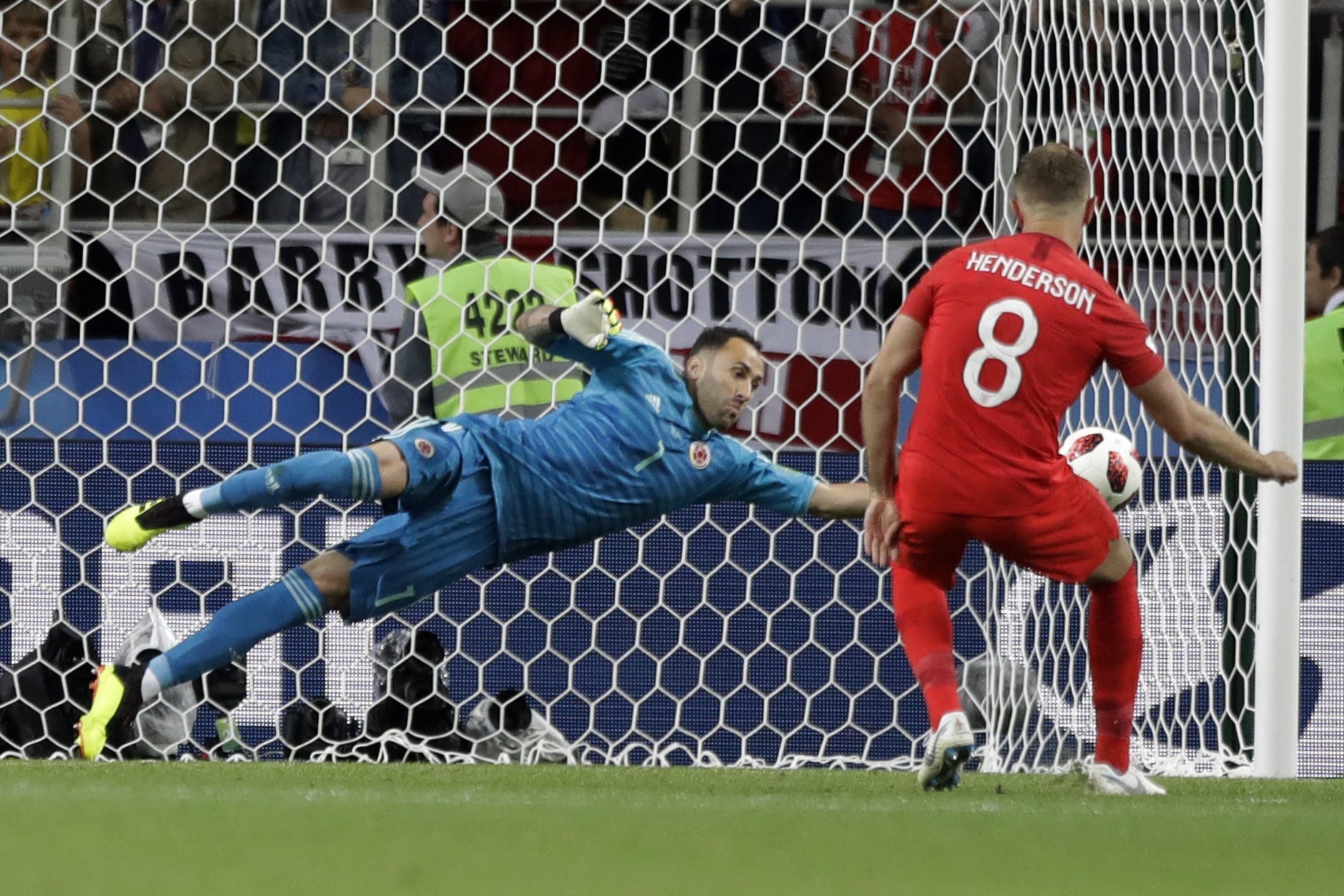 Colombia goalkeeper David Ospina saves a penalty during the round of 16 match between Colombia and England at the 2018 soccer World Cup in the Spartak Stadium, in Moscow, Russia, Tuesday, July 3, 2018. (AP Photo/Matthias Schrader)
