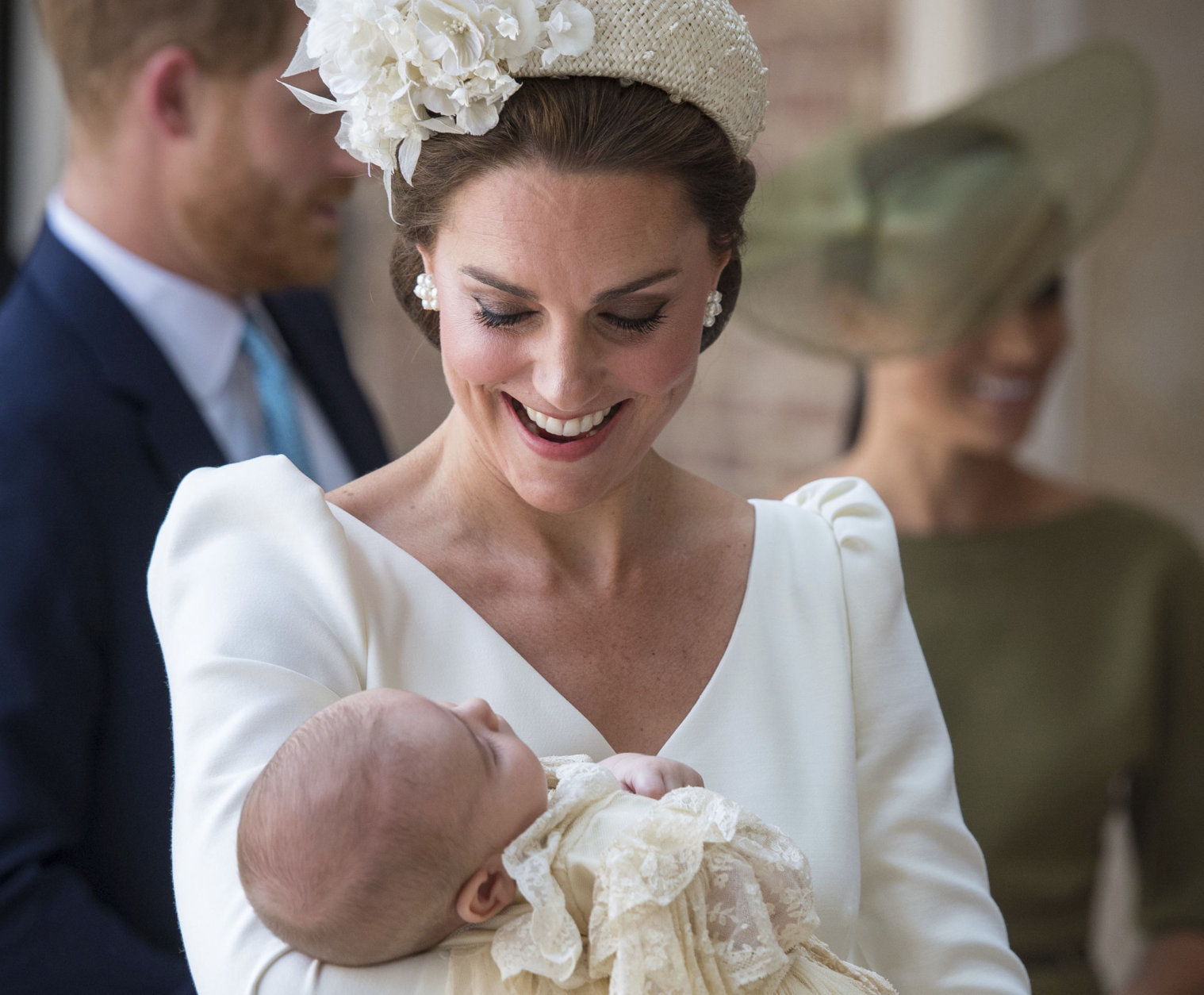 Kate, Duchess of Cambridge carries Prince Louis as they arrive for his christening service at the Chapel Royal, St James's Palace, London, Monday, July 9, 2018. (Dominic Lipinski/Pool Photo via AP)