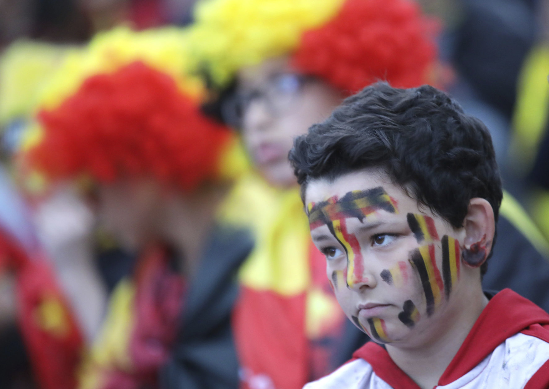 A Belgium fan reacts as he watches a 2018 World Cup semifinal soccer match between France and Belgium on a giant screen in Jette, Belgium, Tuesday, July 10, 2018. (AP Photo/Olivier Matthys)