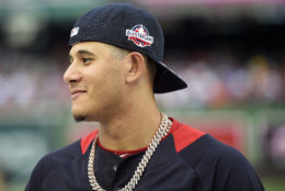American League, Baltimore Orioles Manny Machado walks on the field after batting practice ahead of the All-Star Home Run Derby Baseball event, Monday, July 16, 2018, at Nationals Park, in Washington. The 89th MLB baseball All-Star Game will be played Tuesday. (AP Photo/Nick Wass)