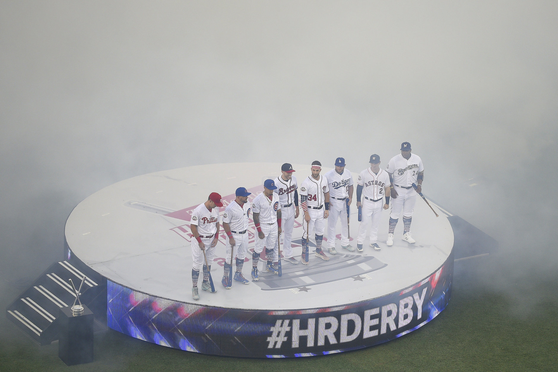 MLB players line up before the MLB Home Run Derby, at Nationals Park, Monday, July 16, 2018 in Washington. The 89th MLB baseball All-Star Game will be played Tuesday. (AP Photo/Nick Wass)