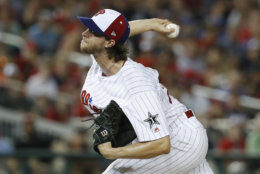Philadelphia Phillies pitcher Aaron Nola (27) works during the fifth inning at the Major League Baseball All-star Game, Tuesday, July 17, 2018 in Washington. (AP Photo/Alex Brandon)