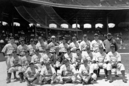 The National League team poses before the first major league All-Star Game in Chicago, Ill., on July 6, 1933.  The American League won 4-2.  Front row, from left: bat boy Hasbrook, Pepper Martin, Lon Warneke, Tony Cuccinello.  Middle row, from left: Bill Hallahan, Dick Bartell, Bill Terry, Bill McKechnie, John McGraw, Max Carey, Chick Hafey, Chuck Klein, Lefty O'Doul, Wally Berger.  Back row, from left: Gabby Hartnett, Hack Wilson, Frankie Frisch, Carl Hubbell, Bill Walker, Paul Warner, Woody English, Hal Schumacher, Pie Traynor, trainer Andy Lotshaw.  (AP Photo)