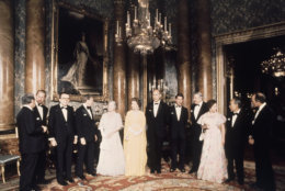 The Queen and members of the Royal Family, in the Blue Drawing Room at Buckingham Palace in London in May 1977, they entertained the seven world in London for the two day Downing Street Summit talks to dinner. They are (from left): Pierre Trudeau (Canada), Takeo Fukuda (Japan), Princess Margaret, James Callaghan, Prince Charles, Giscard dEstaing (France), The Queen, The Queen Mother, President Carter (USA), Giulio Andreotti (Italy), Prince Philip and Helmut Schmidt (West Germany). (AP Photo)