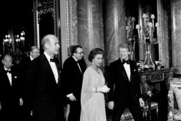 Queen Elizabeth II chats with French President Giscard d'Estaing and President Jimmy Carter, May 7, 1977, at Buckingham Palace while posing for photographers prior to the State Dinner.  (AP Photo)