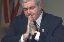 House Speaker Newt Gingrich speaks during a weekly GOP radio address in his Capitol office Saturday, July 25, 1998, in Washington.  With a tear running down his right cheek, Gingrich bowed his head in prayer. "Please help this country learn to live with its freedom," he said.  Investigators are trying to learn how and why the gunman stormed the Capitol building filled with lawmakers and tourists, and opened fire before being shot and captured. A tourist was wounded in the fire fight. (AP Photo/Harry Hamburg, Pool)