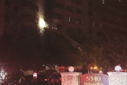 Crews respond to a two-alarm fire at an Alexandria high-rise early Monday morning. (Courtesy Alexandria Fire Department via Twitter)