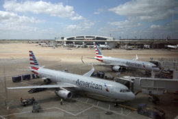 In this June 16, 2018 photo, American Airlines aircrafts are seen at Dallas-Fort Worth International Airport in Grapevine, Texas. (AP Photo/Kiichiro Sato)