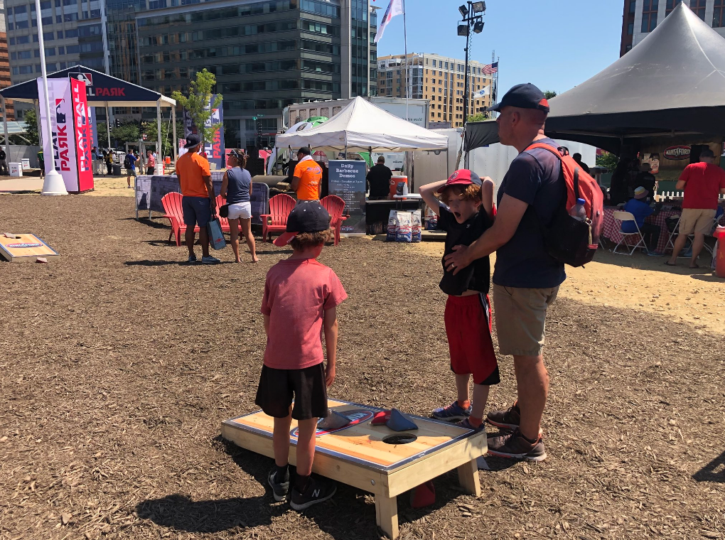 The Play Ball Park across from Nationals Stadium features activities like cornhole all weekend long. (WTOP/Melissa Howell)